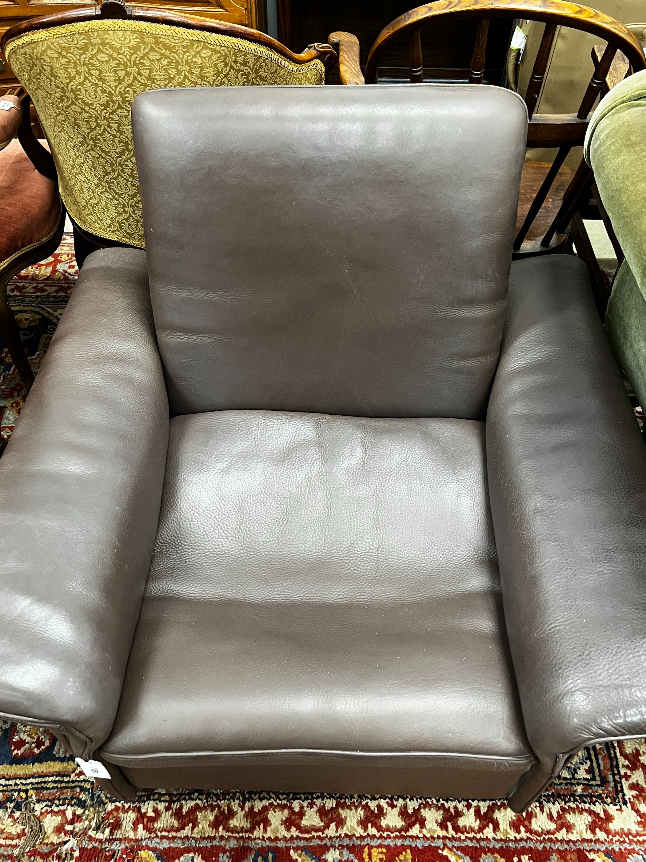 A De Sede brown leather armchair, width 92cm, depth 83cm, height 80cm